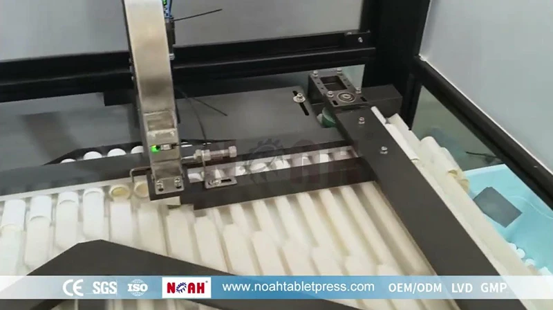 Machine de remplissage et de bouchage automatique de tubes de comprim&eacute;s NTF-600 | NO&Eacute;