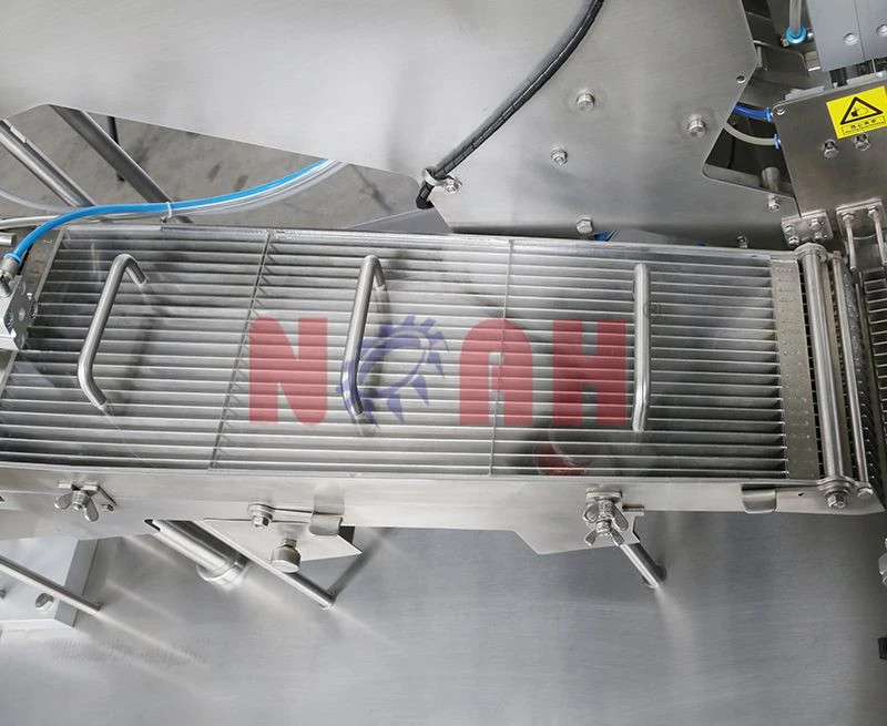 Machine de remplissage et de capsulage automatique de tubes de comprim&eacute;s NTF-100